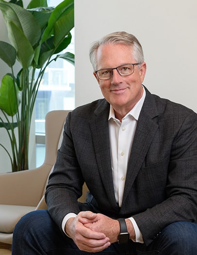 Chris-Nedelmann-CEO-couch-headshot